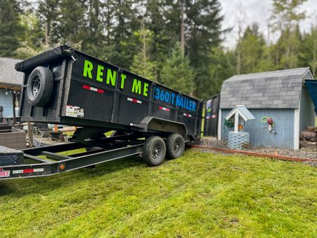 PNW Trailer Rentals dump trailer unloading gravel